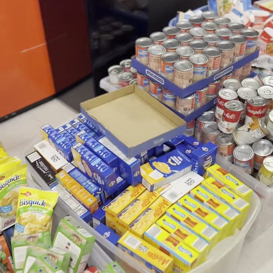 Volunteers loading vehicles for Thanksgiving deliveries